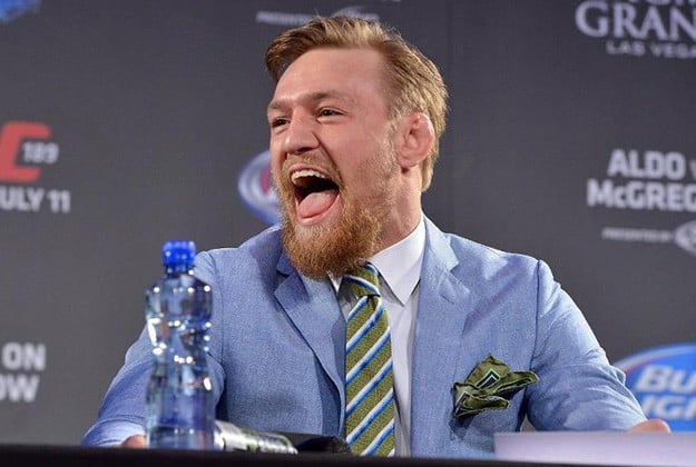Conor McGregor laughing at a press conference