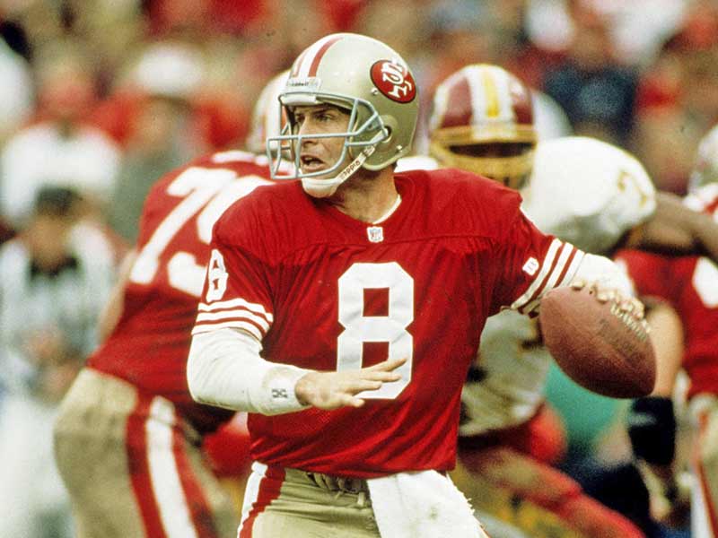 Steve Young of 49ers about to throw the ball